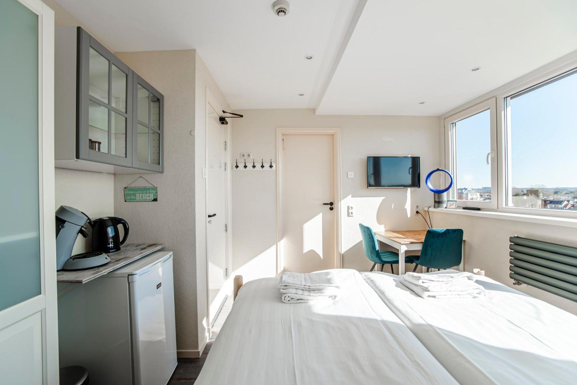 Pension Sixtysix Зандфорт Номер фото